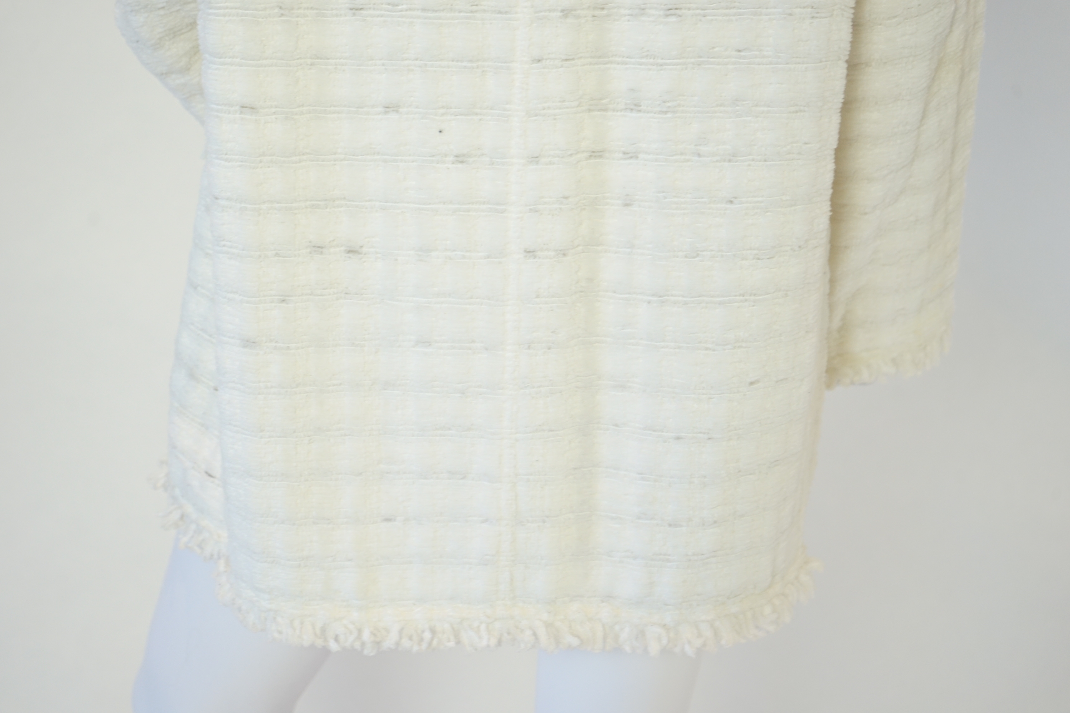 A Chanel early 1990's cream boutique jacket, size 40